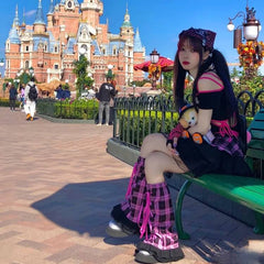 Black pink ribbon leg warmers