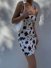 Cow Print Tie Strap Mini Dresses